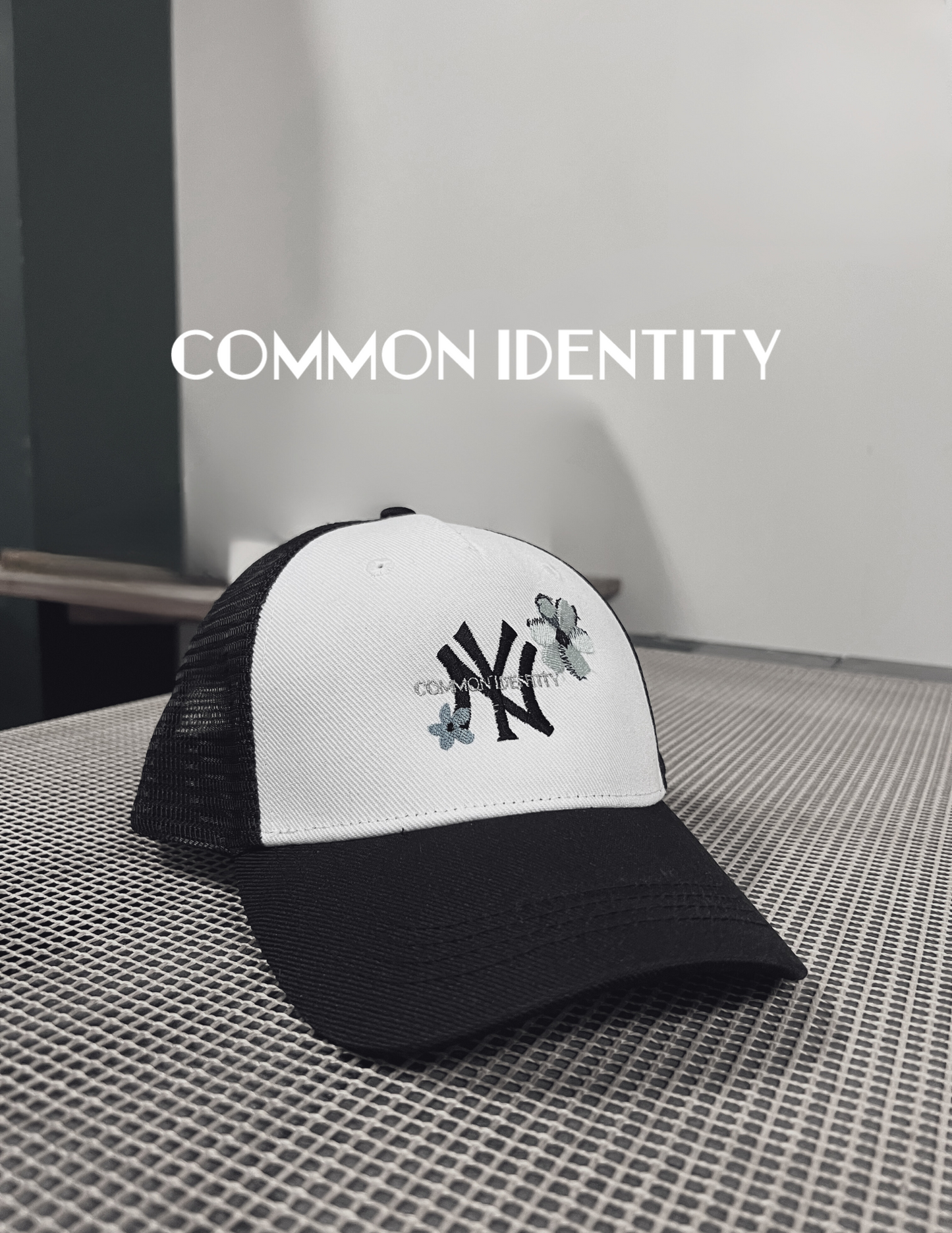 New York - Common Identity Flowers - Trucker Hat